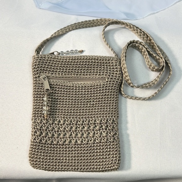 Chateau Handbags - Chateau crochet crossbody purse taupe with green lining zip closure